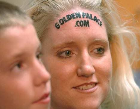 goldencasinoforeheadtattoooutrageou.jpg golden casino forehead tattoo 